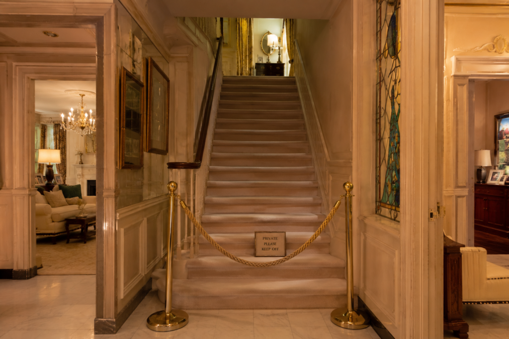 Roped-off staircase inside Graceland leading to Elvis Presley's private second-floor living quarters