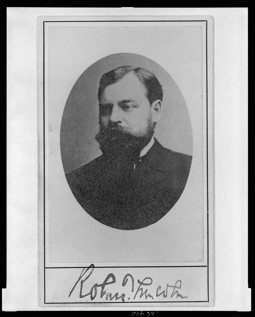 Historic head-and-shoulders portrait of Robert Todd Lincoln, wearing a dark suit and facing left.